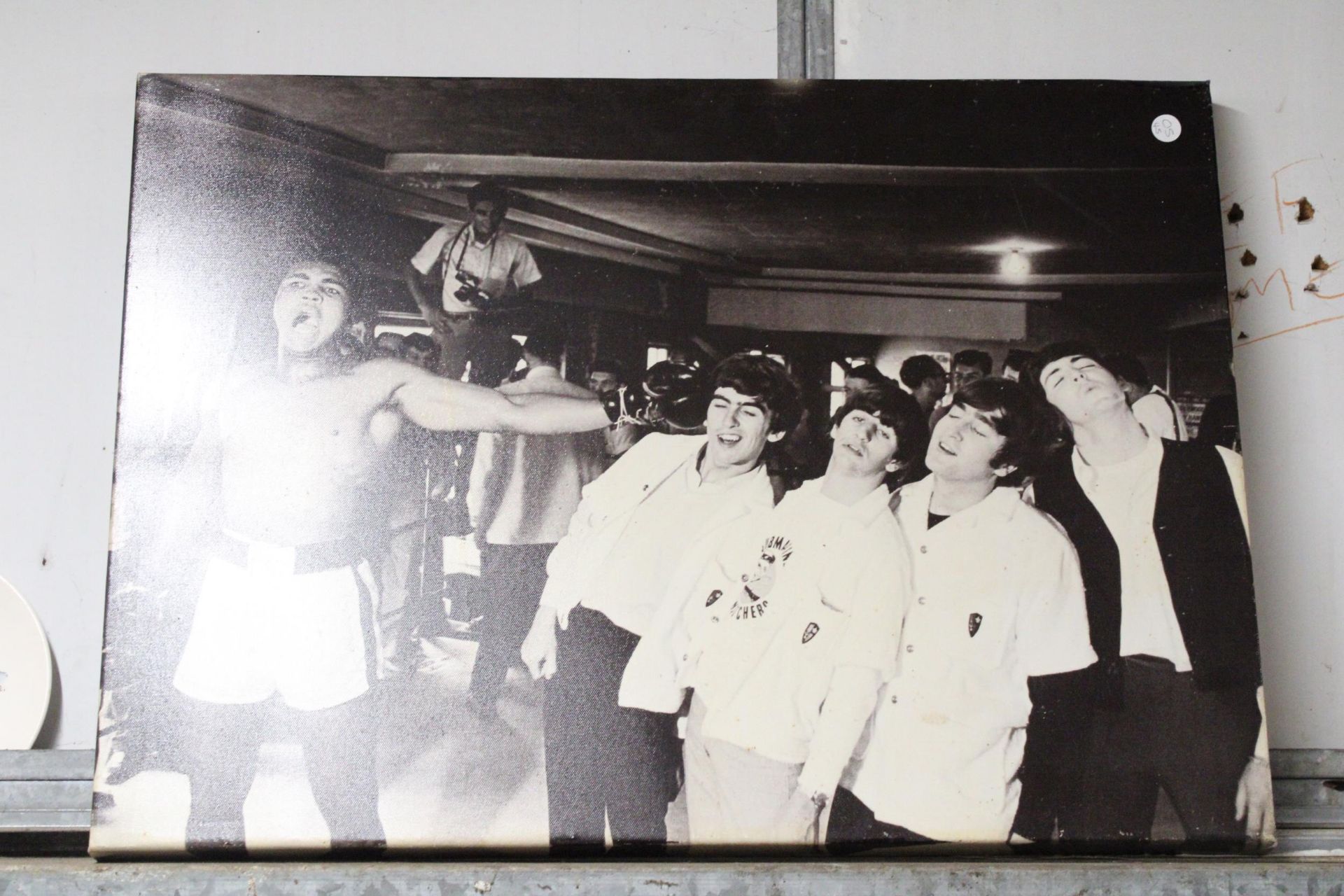 A 1963 BEATLES PLATE PLUS CANVAS PHOTO OF THE BEATLES AND MUHAMMAD ALI - APPROXIMATELY 50 CM X 70 CM