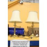 A PAIR OF VINTAGE SWING ARM BRASS LAMPS WITH SHADES