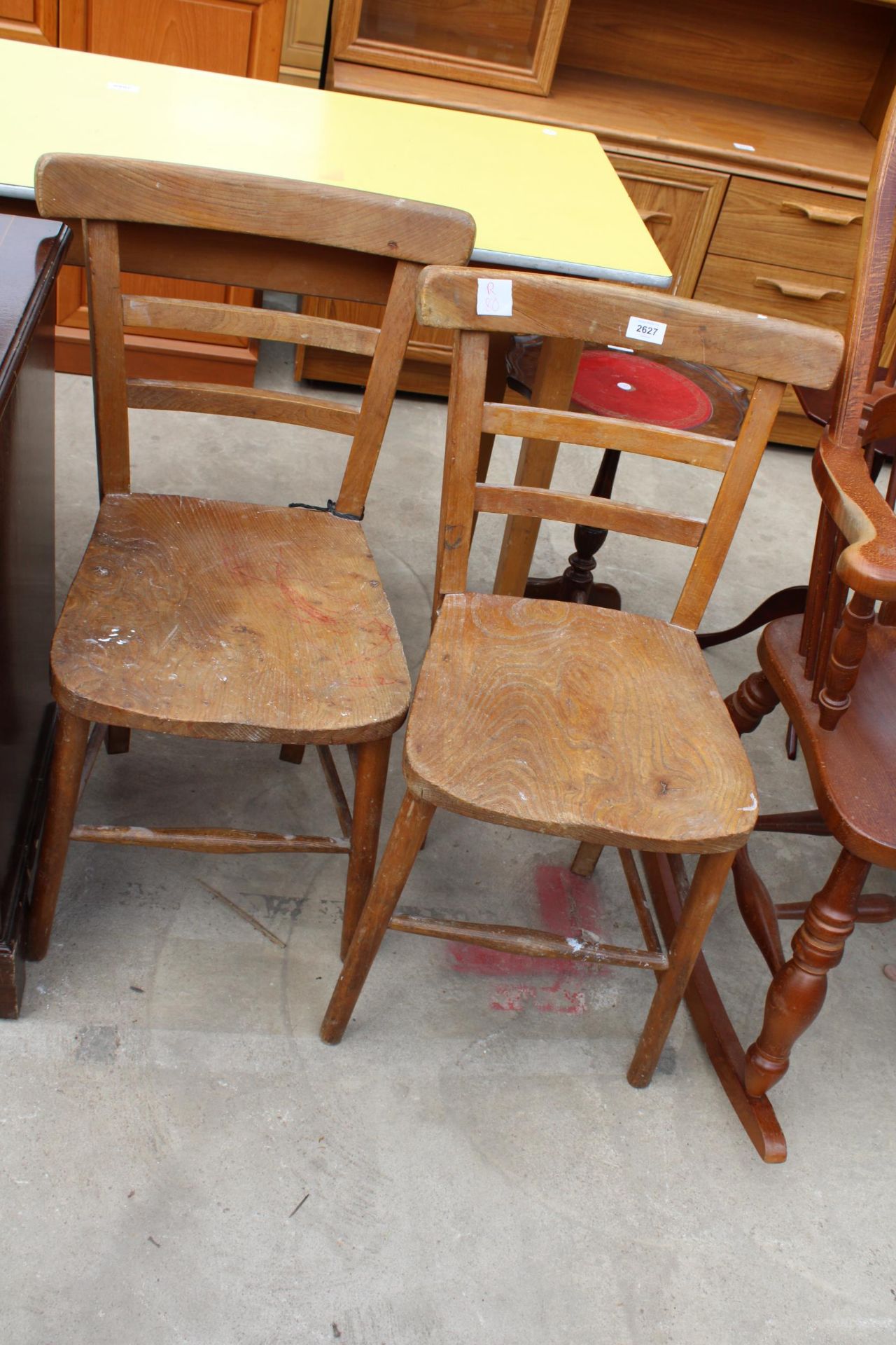 A PAIR OF MID 20TH CENTURY ELM AND BEECH KITCHEN CHAIRS