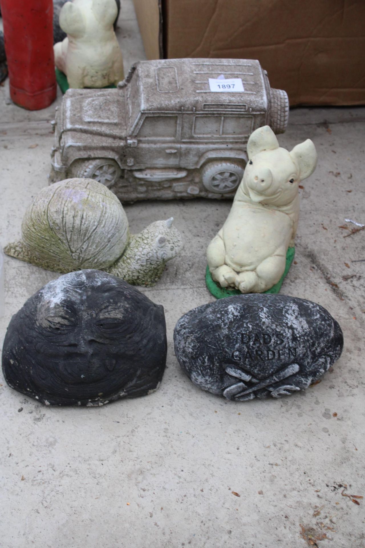 FIVE CONCRETE GARDEN FIGURES TO INCLUDE A JEEP AND A PIG ETC