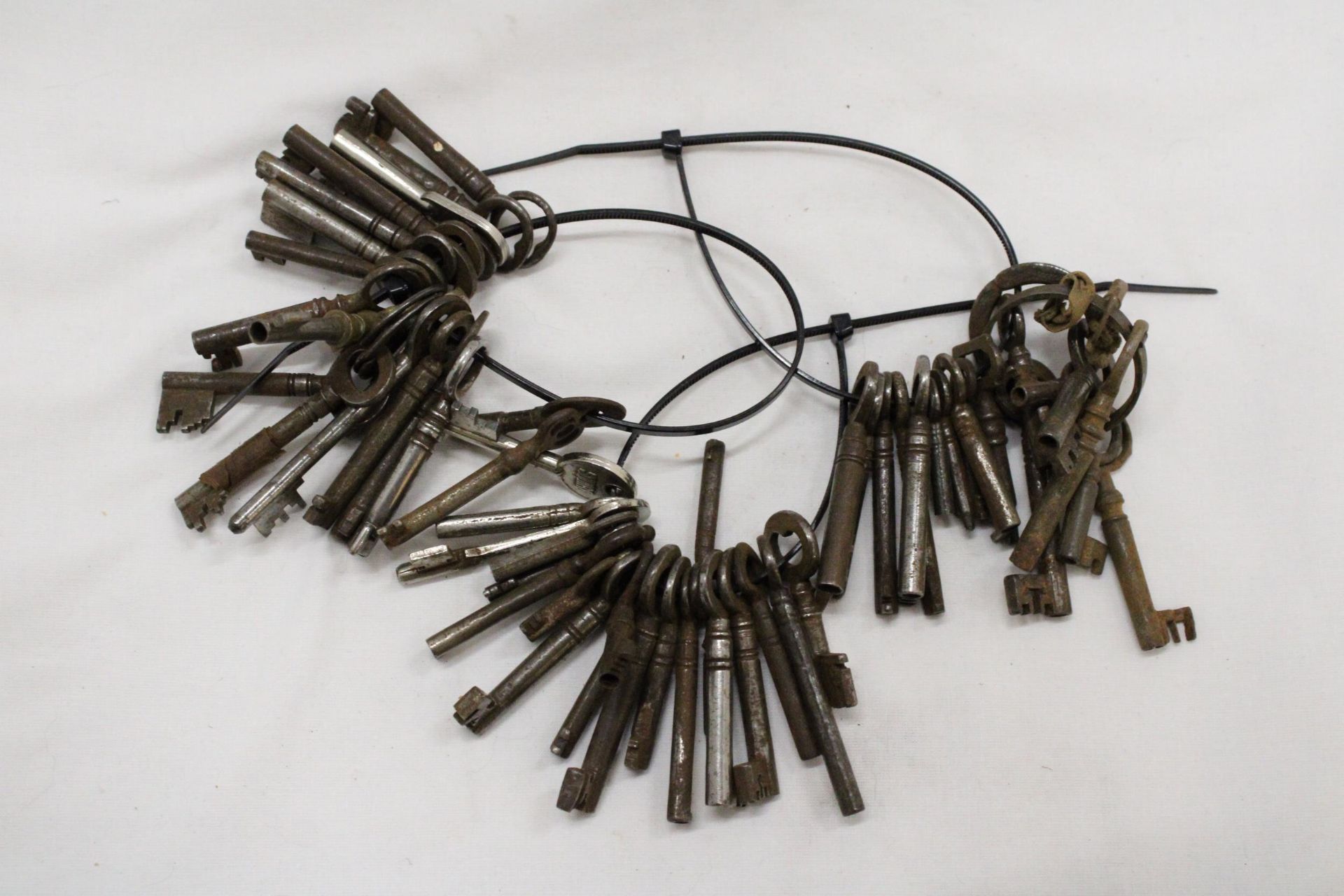 THREE SETS OF VINTAGE KEYS