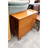 A RETRO TEAK DROP-LEAF DINING TABLE, 60" X 33" OPENED