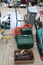 AN ELECTRIC LAWN MOWER WITH A BOX OF SPARES TO INCLUDE A LAWN RAKE CARTRIDGE ETC