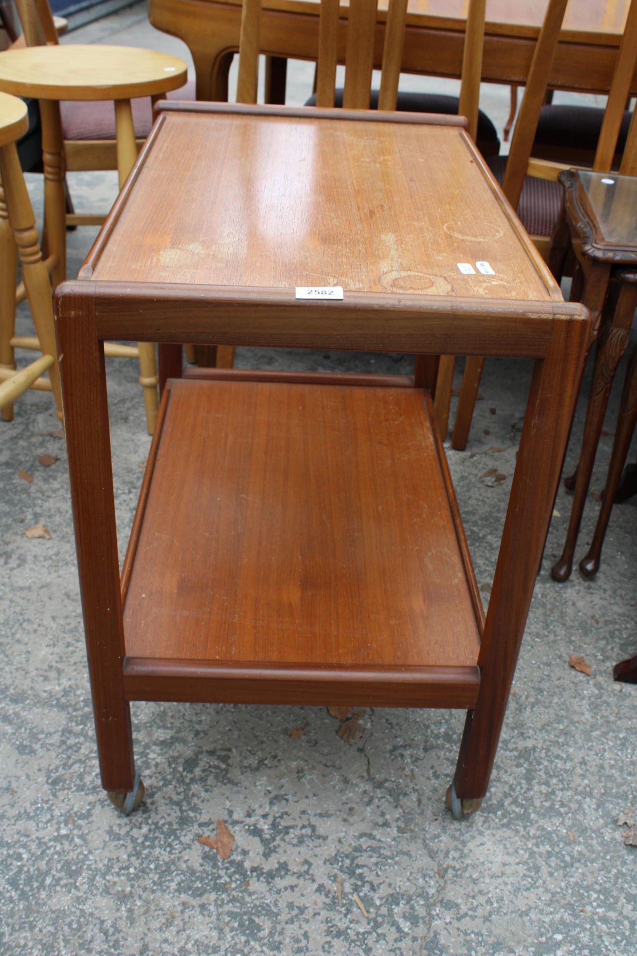 A RETRO TEAK TWO TIER TROLLEY ON CASTERS - Image 2 of 2