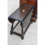 A MODERN OAK MINIATURE DROP LEAF TABLE