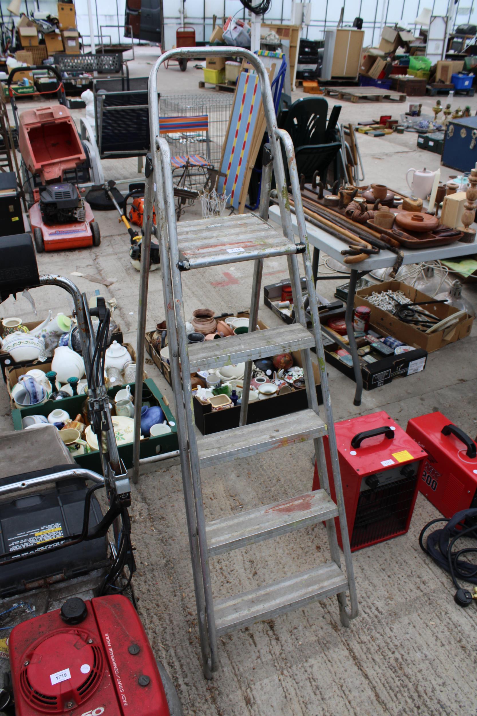 AN ABRU FOUR RUNG ALUMINIUM STEP LADDER