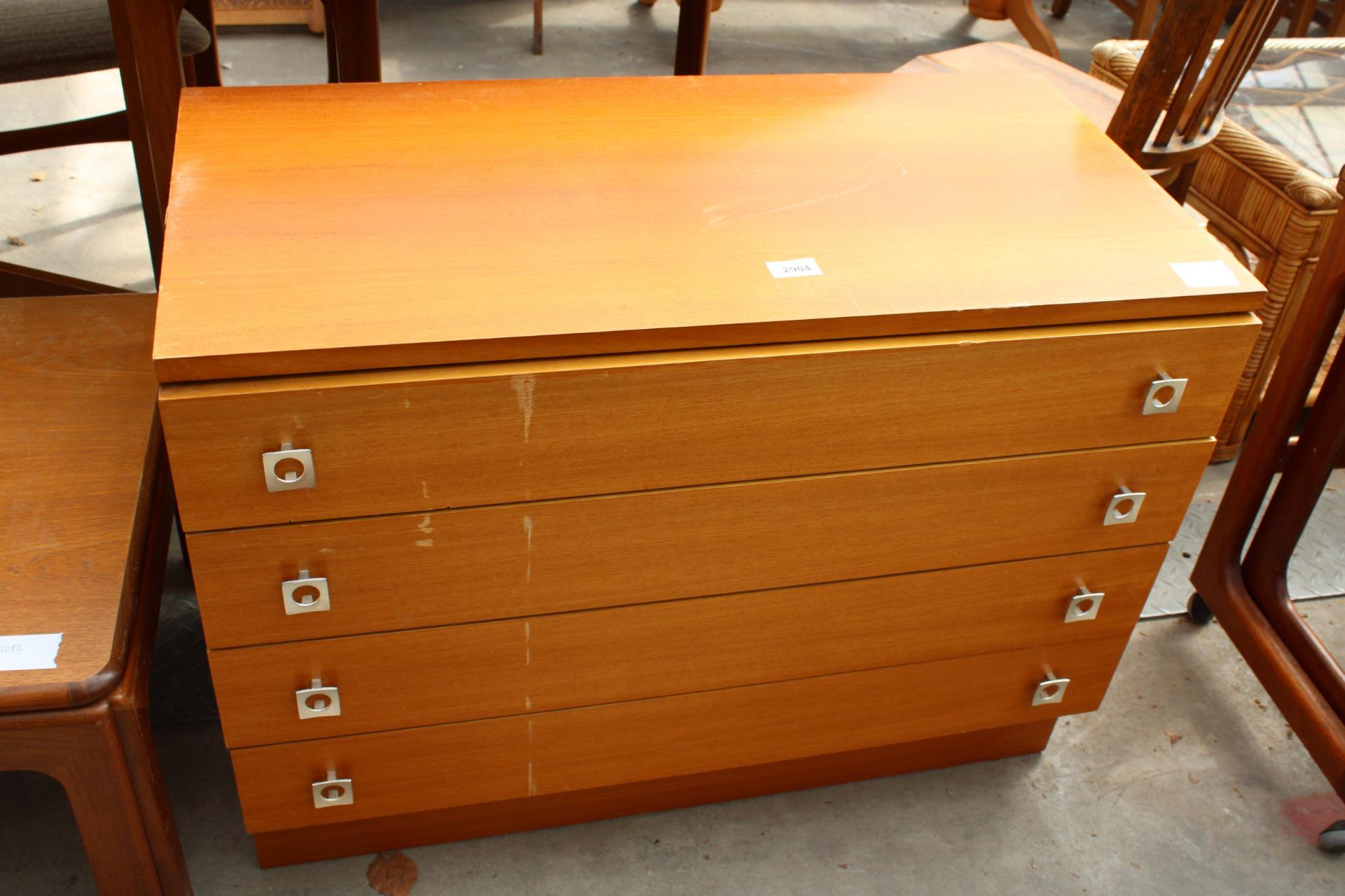 A RETRO TEAK CHEST OF FOUR DRAWERS, 32" WIDE