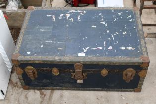 A VINTAGE WOODEN TRAVEL TRUNK