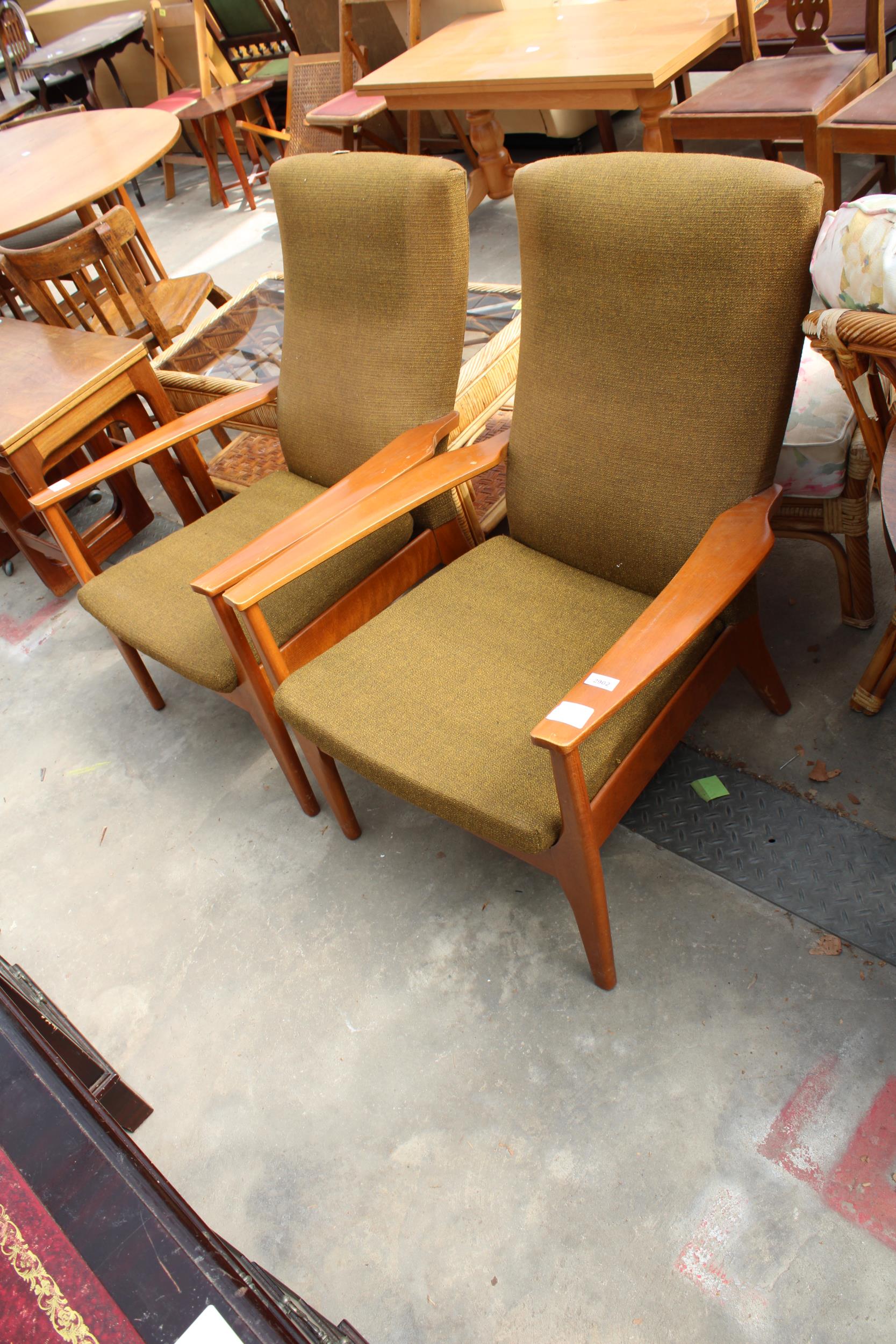 A PAIR OF PARKER KNOLL FIRESIDE CHAIRS, MODEL P.K.988-1023
