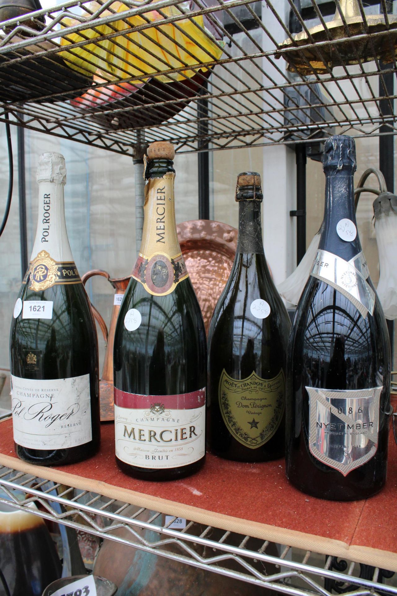 FOUR GLASS CHAMPAGNE DISPLAY BOTTLES