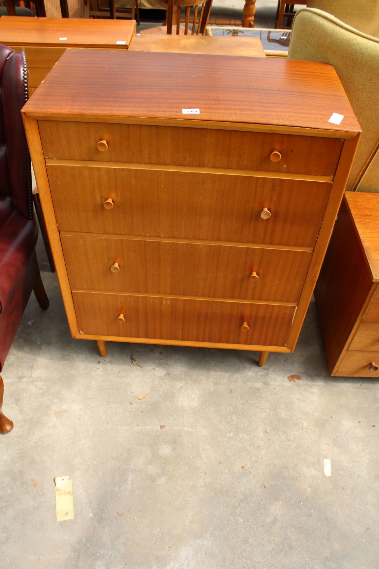 A RETRO TEAK CHEST OF FOUR DRAWERS ON TAPERING LEGS, 30" WIDE