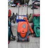 A ROLLER COMPACT 400 FLYMO LAWN MOWER AND AN ELECTRIC BLACK AND DECKER GRASS STRIMMER