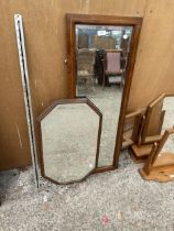 AN OAK OCTAGONAL MIRROR AND AN INLAID MAHOGANY MIRROR