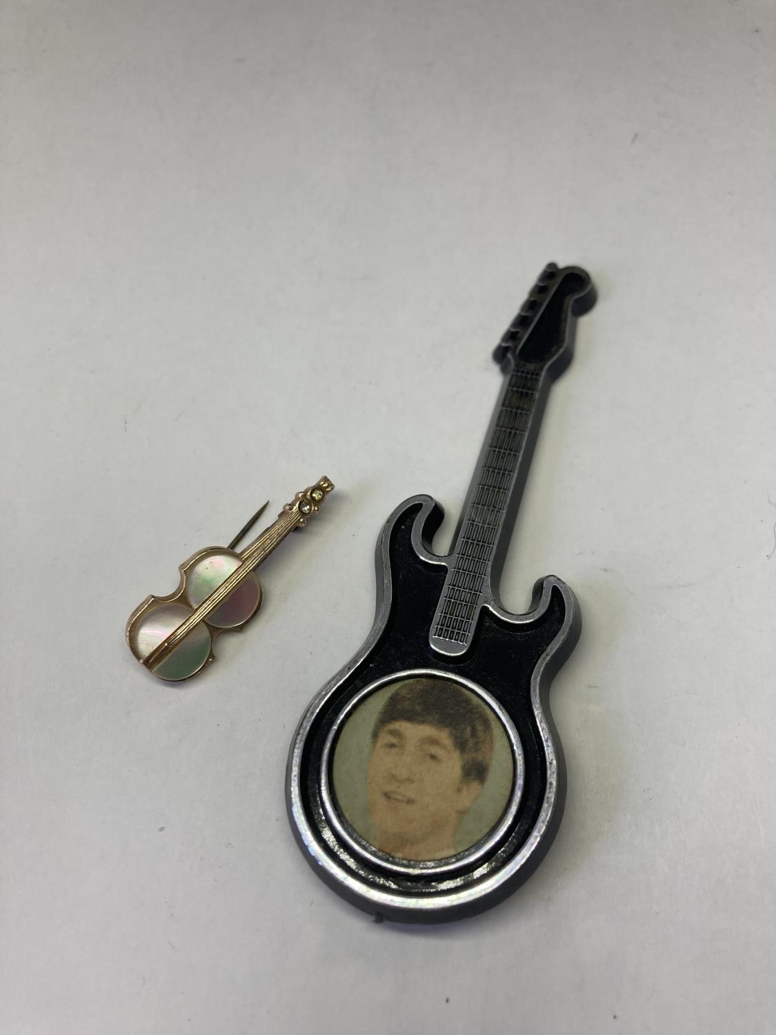 A RARE VINTAGE BEATLES GUITAR BROOCH AND A MOTHER OF PEARL EXAMPLE