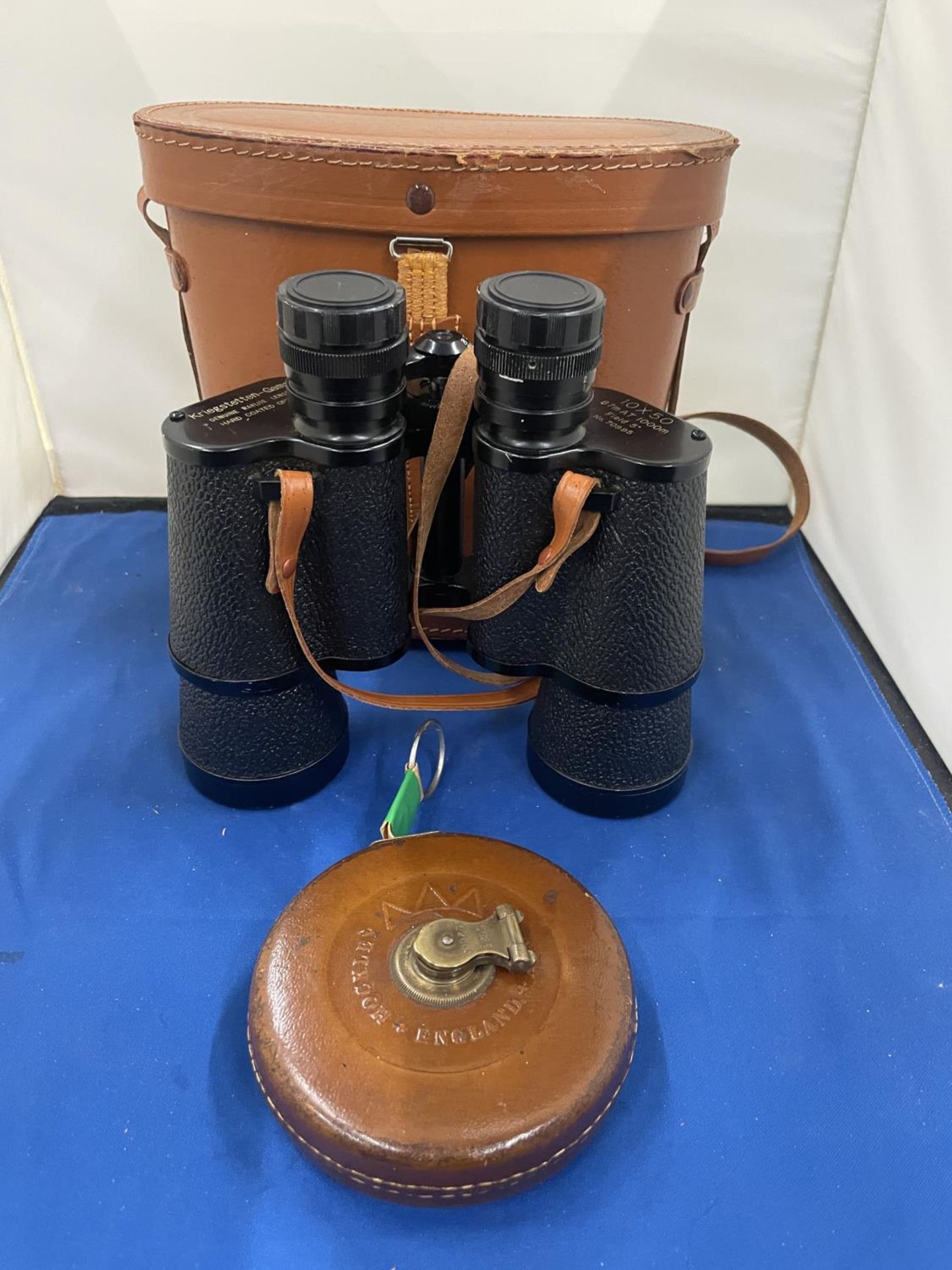 A PAIR OF KRIEGSTETTEN - GAMA BINOCULARS IN A LEATHER CASE WITH A VINTAGE LEATHER TAPE MEASURE - Image 2 of 8