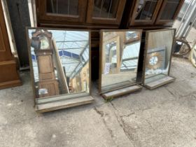 THREE OAK FRAMED MIRRORS WITH LOWER SHELVES