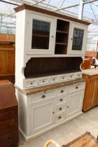 A MODERN PAINTED DRESSER, THE UPPER PORTION ENCLOSING TWO GLAZED CUPBOARDS AND SIX SPICE DRAWERS,