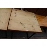 A RUSTIC FOUR PLANK TABLE, 35" SQUARE ON METAL LEGS