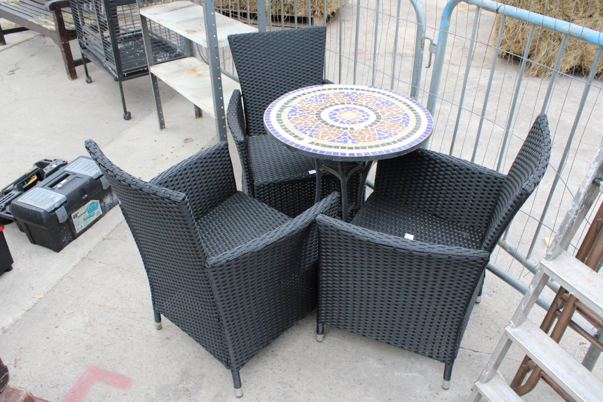 A TILE TOP BISTRO TABLE AND THREE RATTAN CHAIRS