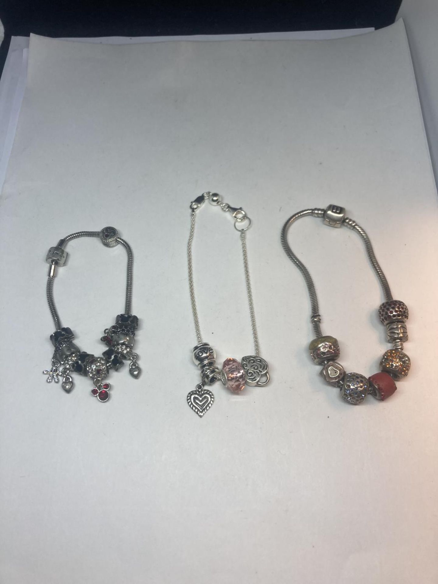 THREE SILVER CHARM BRACELETS TO INCLUDE A DISNEY EXAMPLE - Image 2 of 12
