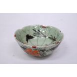 A CHINESE PORCELAIN GLAZED FOOTED BOWL WITH FLORAL DECORATION