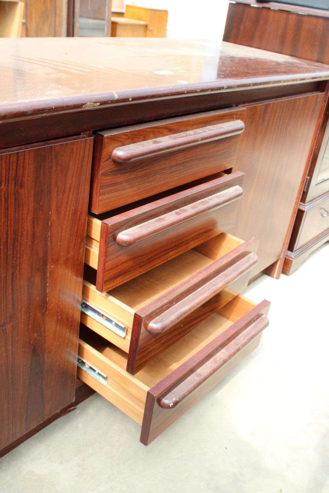 A RETRO HARDWOOD SIDEBOARD ENCLOSING 4 DRAWERS, 2 CUPBOARDS, 63" WIDE - Image 2 of 3