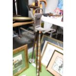 A QUANTITY OF WALKING STICKS TO INCLUDE A SHOOTING STICK