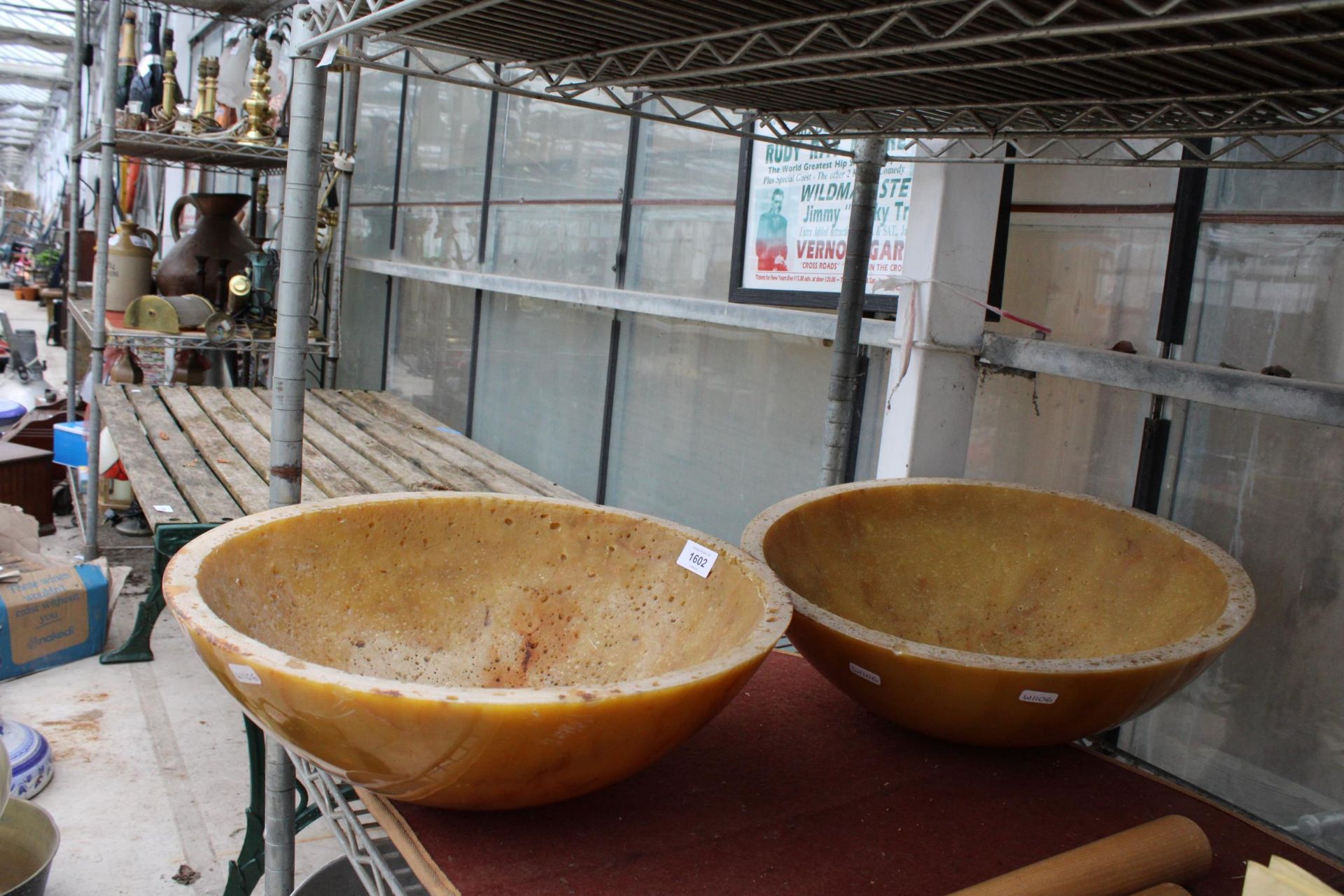 A PAIR OF ORANGE MARBLE BOWLS