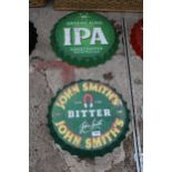 TWO BOTTLE CAP STYLE SIGNS TO INCLUDE JOHN SMITHS ETC