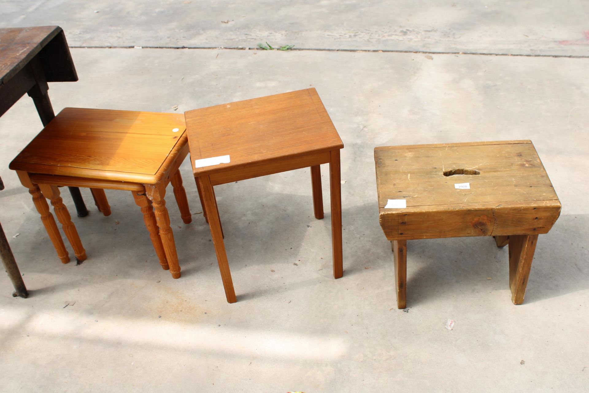 A PINE STOOL, SMALL TEAK TABLE AND A NEST OF TWO TABLES