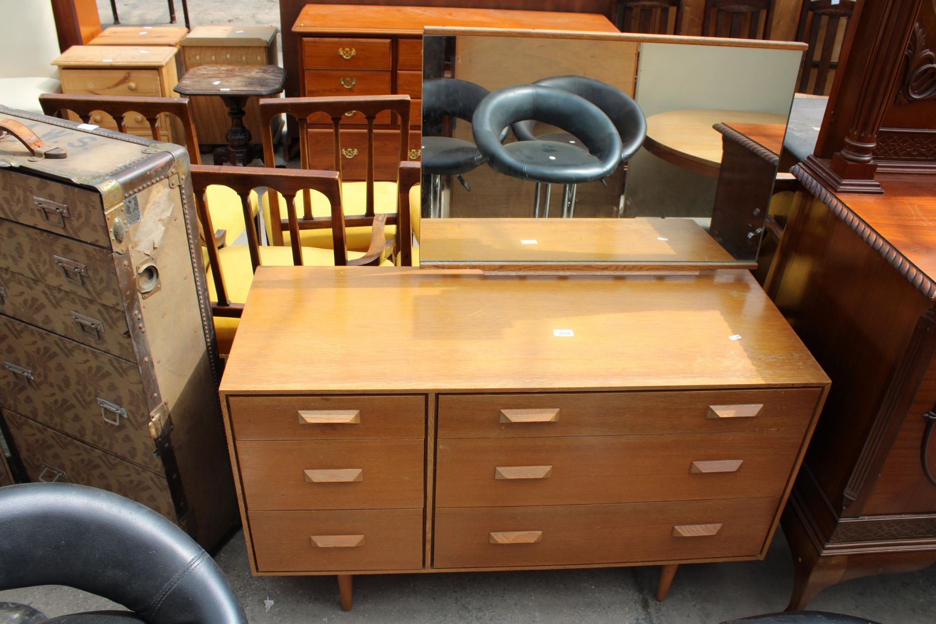 A RETRO STAG DRESSING CHEST ENCLOSING THREE SHORT AND THREE LONG DRAWERS, 44" WIDE