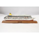 A HEAVY SOLID OCEAN LINER ON WOODEN STAND (ARTEMIS), LENGTH 26CM, HEIGHT 6CM
