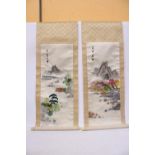 A PAIR OF VINTAGE JAPANESE HANGING SCROLLS WITH SILK EMBROIDERED LANDSCAPE SCENES