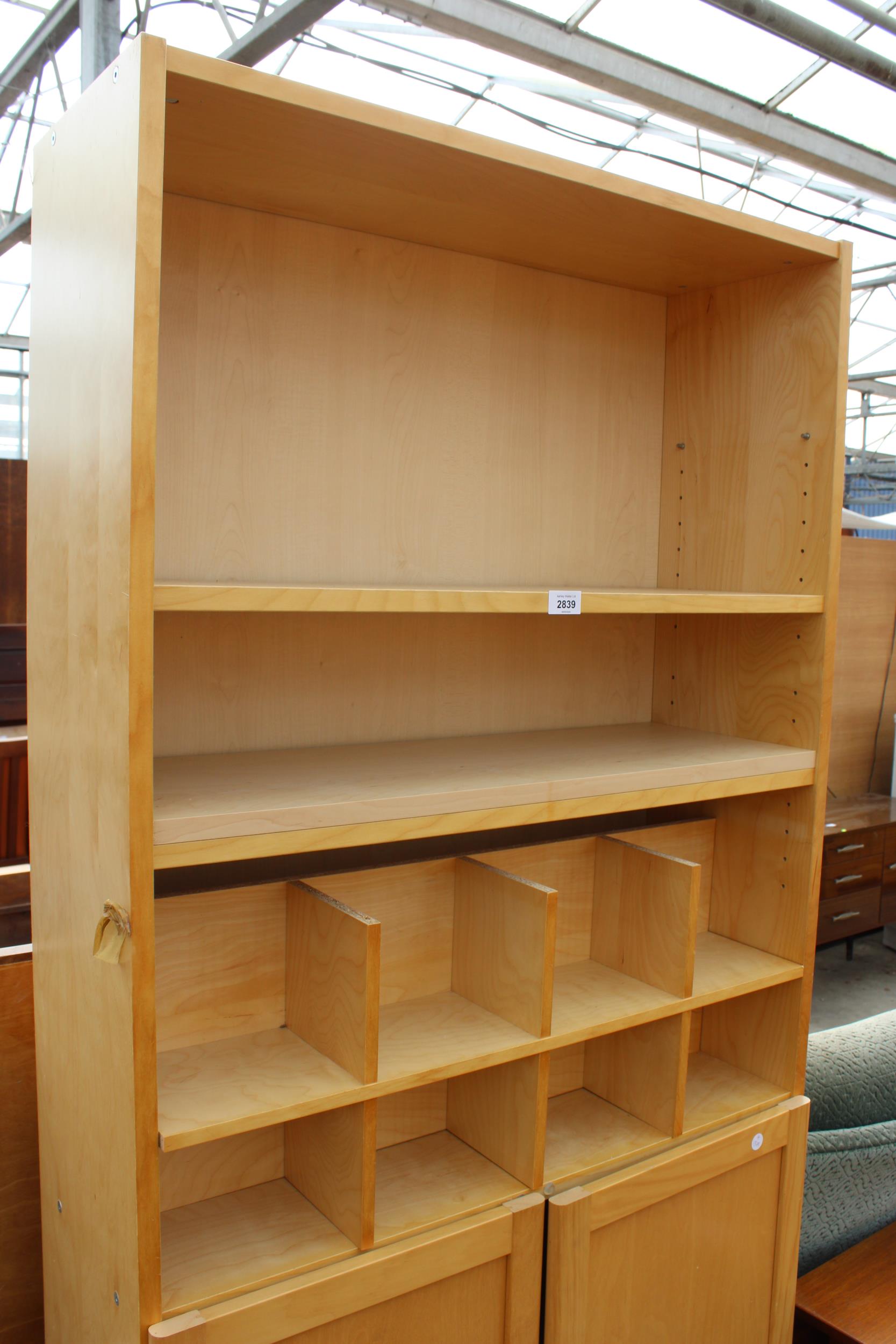 A MODERN PINE EFFECT STORAGE UNIT WITH CUPBOARDS AND SHELVES, 31.5" WIDE - Image 2 of 3