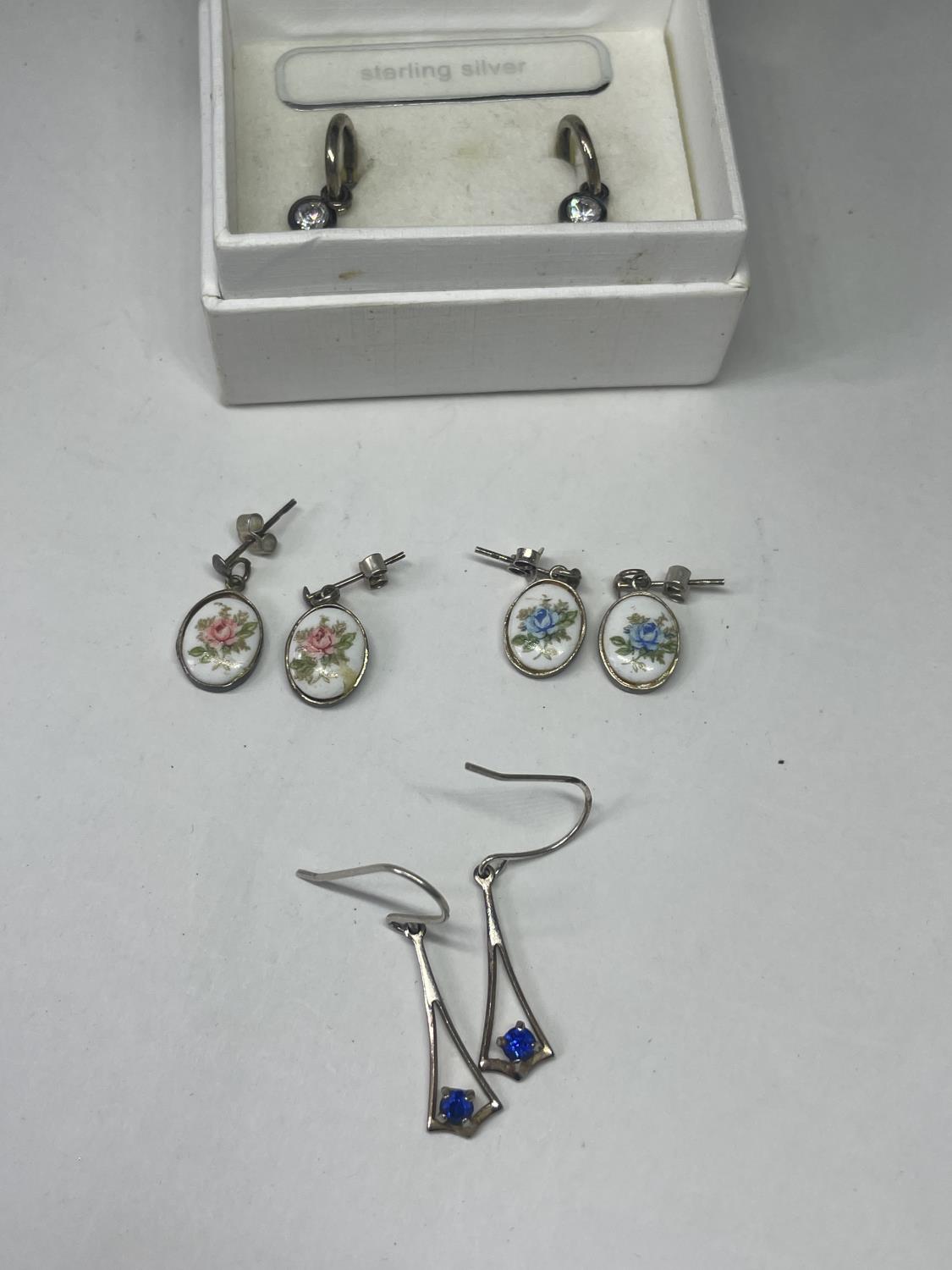 FOUR PAIRS OF SILVER EARRINGS