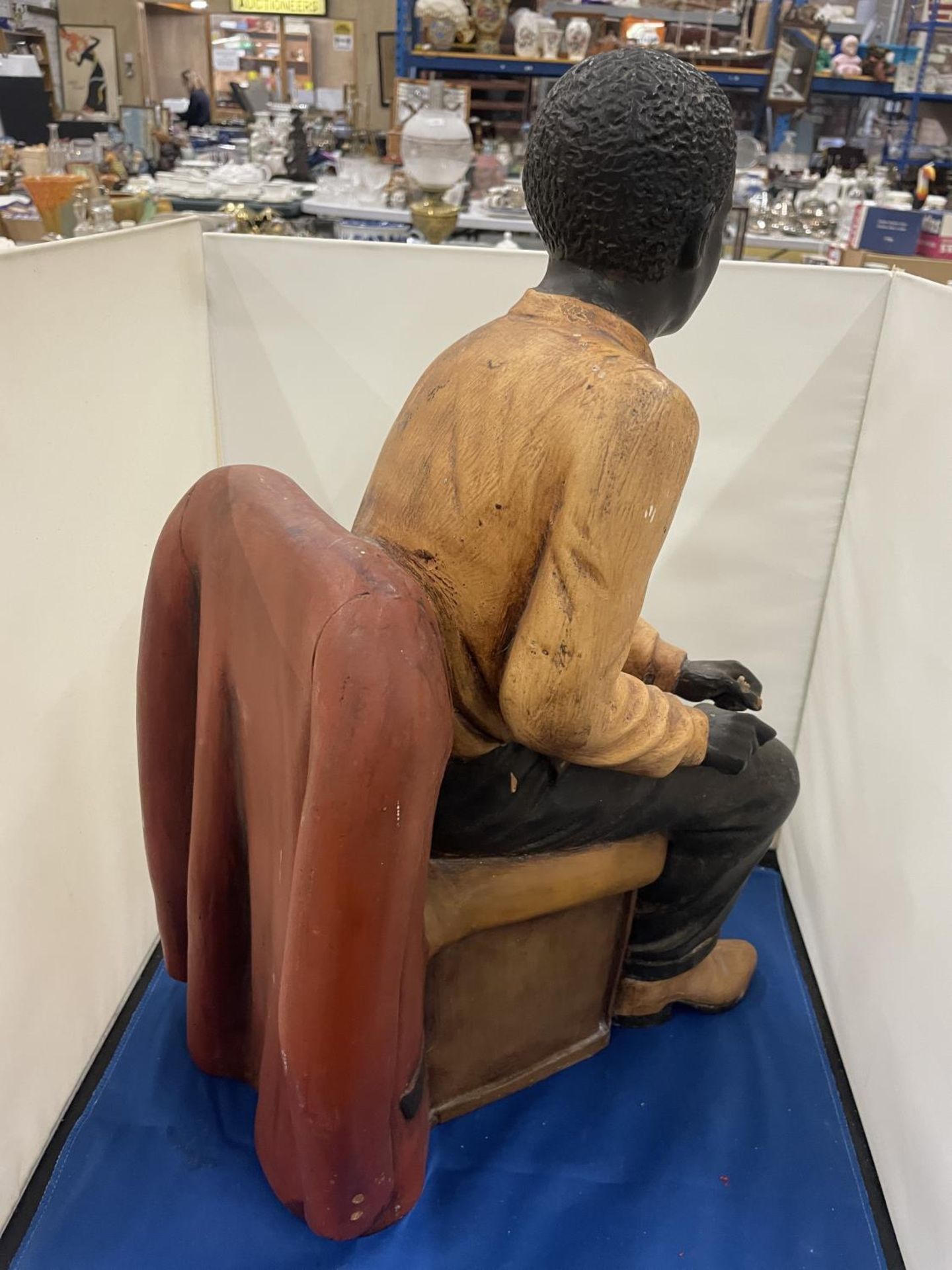 A LARG FIGURE OF A MAN SITTING IN A CHAIR - Image 6 of 8