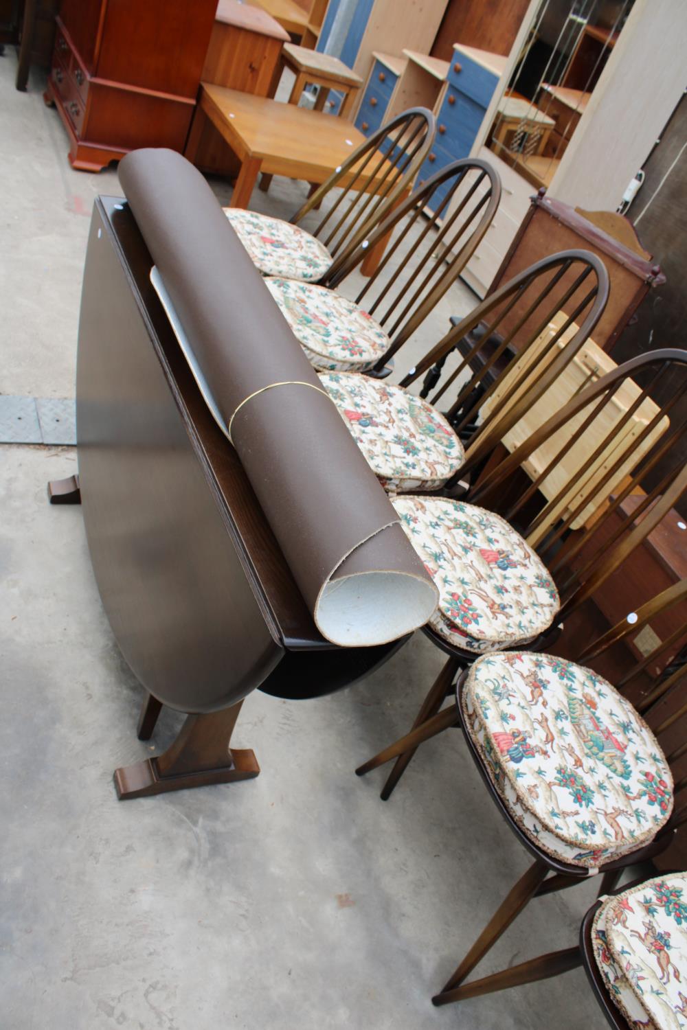 A SET OF SIX ERCOL WINDSOR STYLE DINING CHAIRS AND OVAL GATE-LEG DINING TABLE - 54" X 50" OPENED - Image 6 of 7