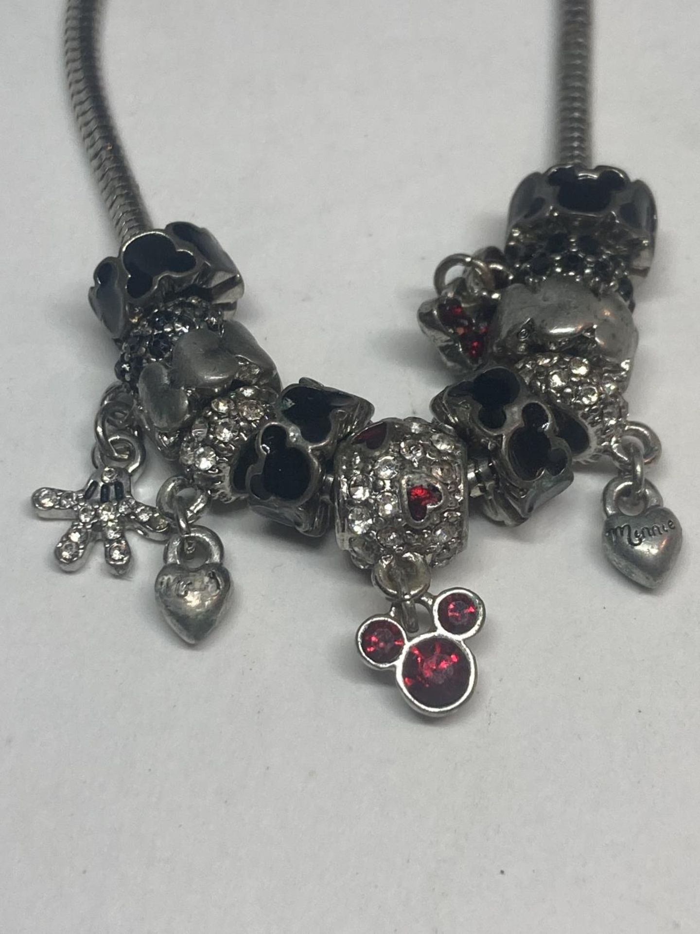 THREE SILVER CHARM BRACELETS TO INCLUDE A DISNEY EXAMPLE - Image 6 of 12