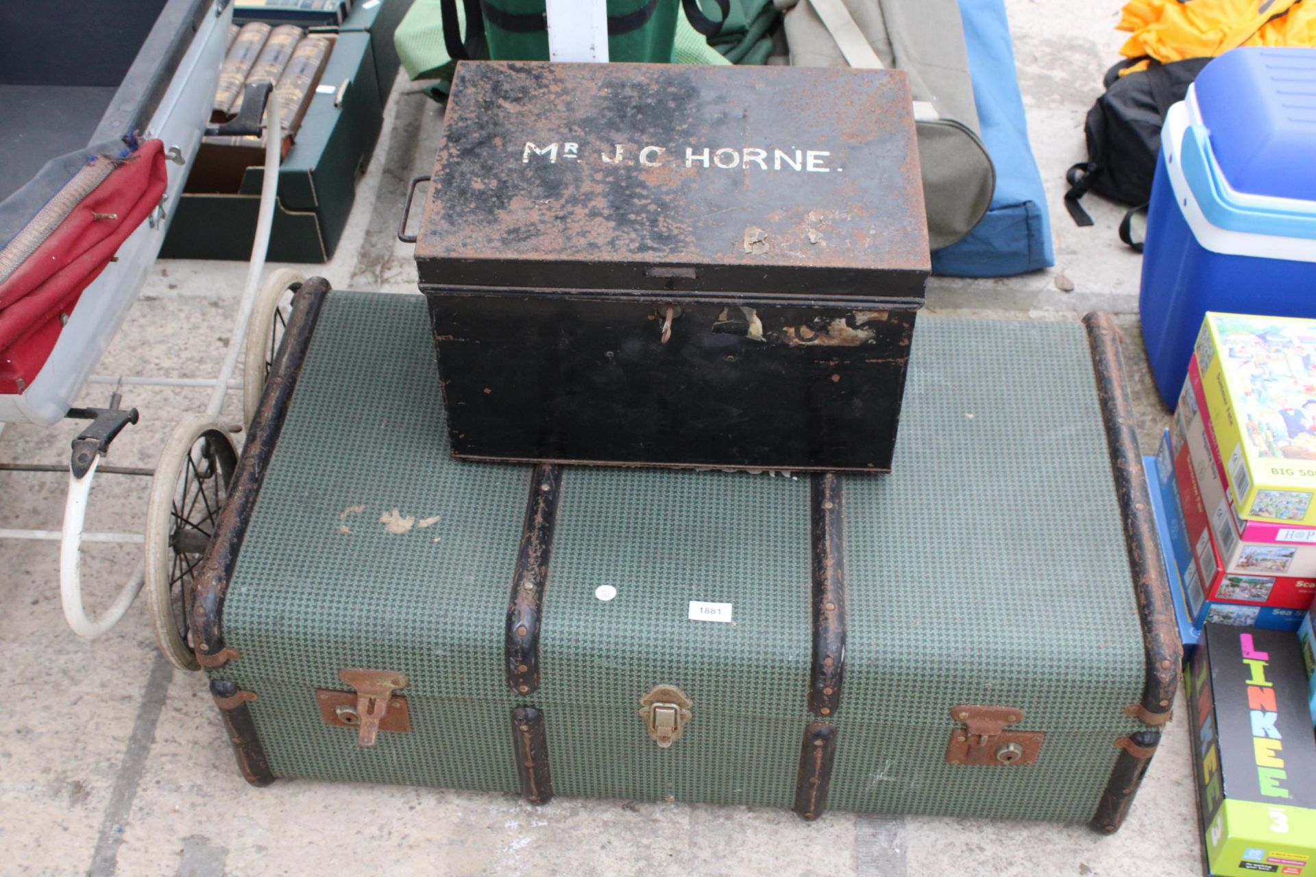A VINTAGE COMPRESSED FIBRE TRAVEL TRUNK AND A VINTAGE DEED TIN