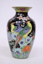 A VINTAGE MID CENTURY JAPANESE VASE FEATURING COLOURFUL PHEASANTS, LOTUS AND CHERRY BLOSSOMS ON A