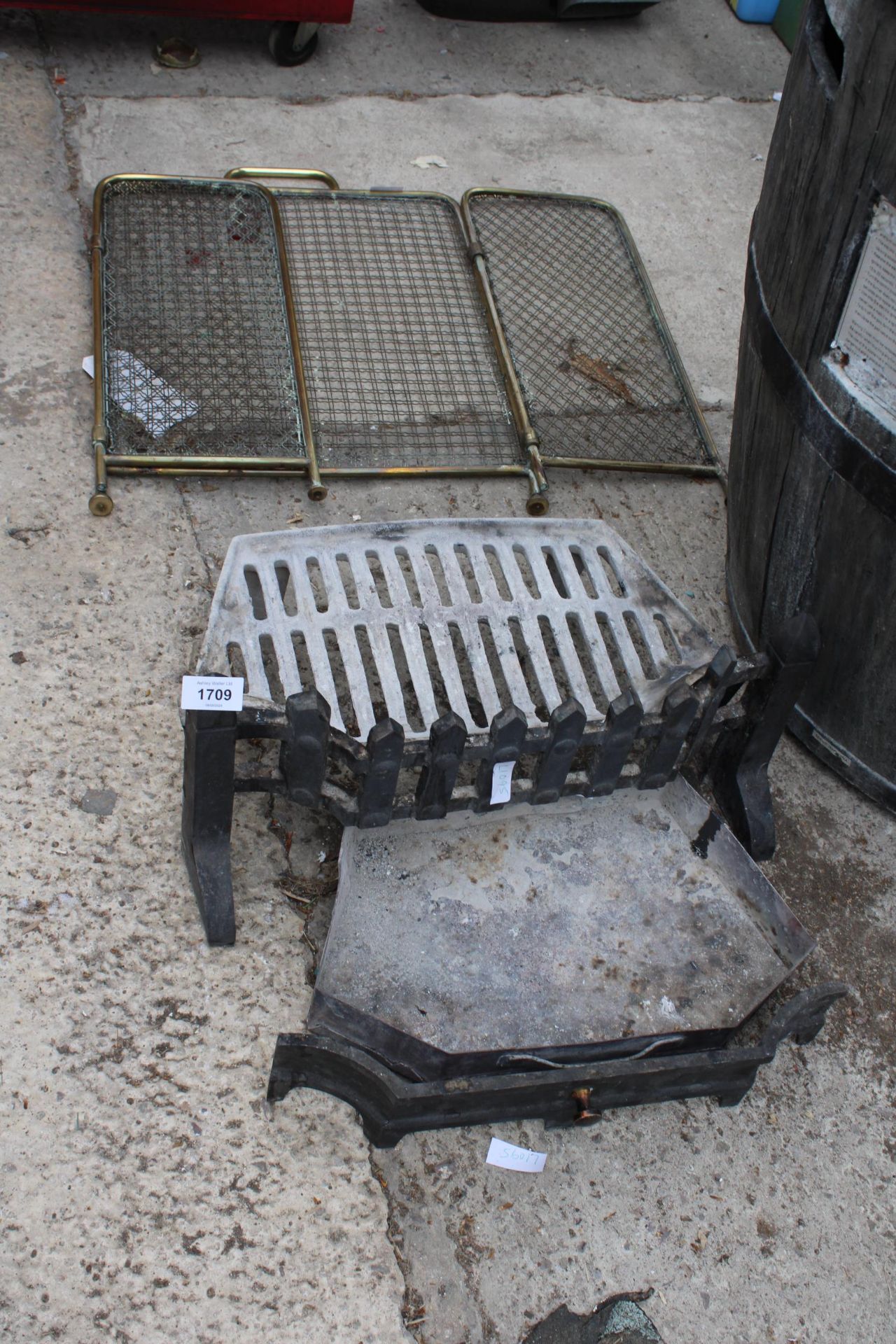 A SMALL FIRE GRATE AND A FIRE SCREEN