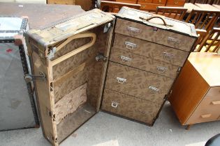 AN EARLY 20TH CENTURY ANTLER LUGGAGE TRAVEL WARDROBE STEAMER TRUNK BEARING VARIOUS TRAVEL LABELS