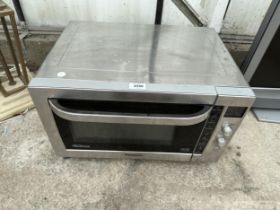 A SILVER PANASONIC COUNTER TOP GRILL