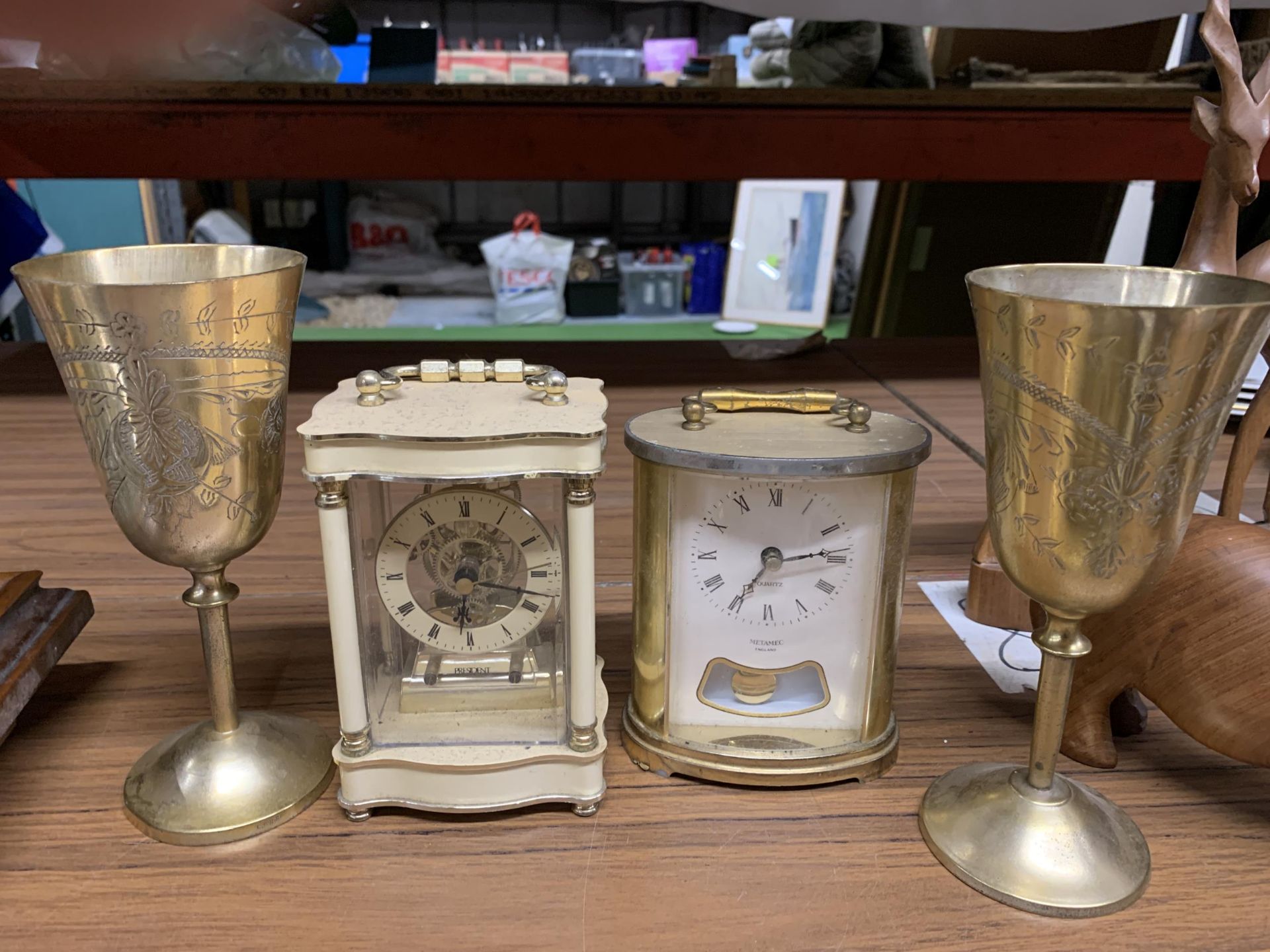 TWO CARRIAGE CLOCKS, A PAIR OF BRASS GOBLETS AND PLATE, A CAT FIGURE, ETC - Image 2 of 3