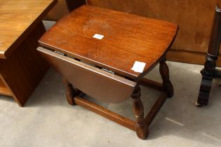 A MINIATURE OAK DROP-LEAF TABLE