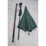 A LEEDA FISHING ROD, A FISHING POLE AND A BROLLY