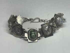 A WHITE METAL ASIAN BRACELET