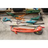 A COLLECTION OF ELCTRICAL GARDEN TOOLS TO INCLUDE A FLYMO STRIMMER, ETC