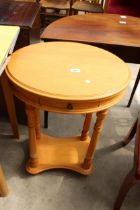 A MODERN OVAL TWO TIER SIDE-TABLE WITH SINGLE DRAWER, 20.5" X 17"