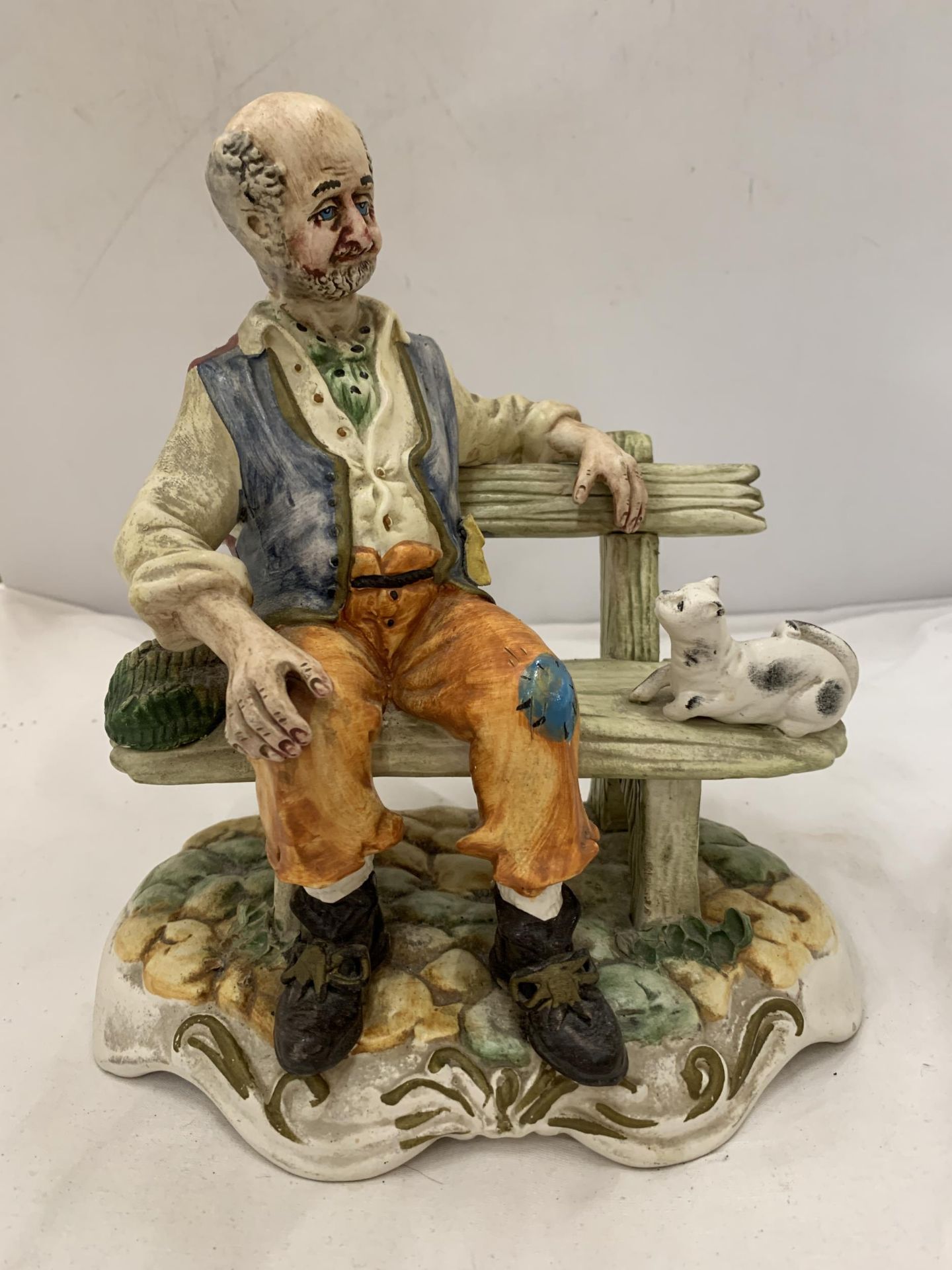 TWO CAPODIMONTE FIGURES OF MEN ON BENCHES - Image 2 of 7